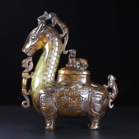 An Exquisite Archaic Jade Auspicious Beast Zun