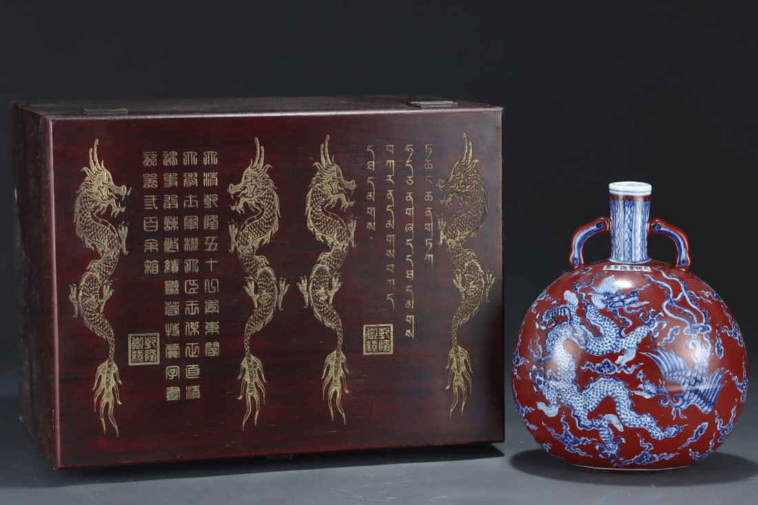 An Exquisite Blue and White Red Glazed Dragon and Phoenix Pattern Double-Ears Vase: An Exquisite Blue and White Red Glazed Dragon and Phoenix Pattern Double-Ears Vase,Ming Dynasty,China,Xuande Six-Character Mark,Size:11.6inx9.4in 