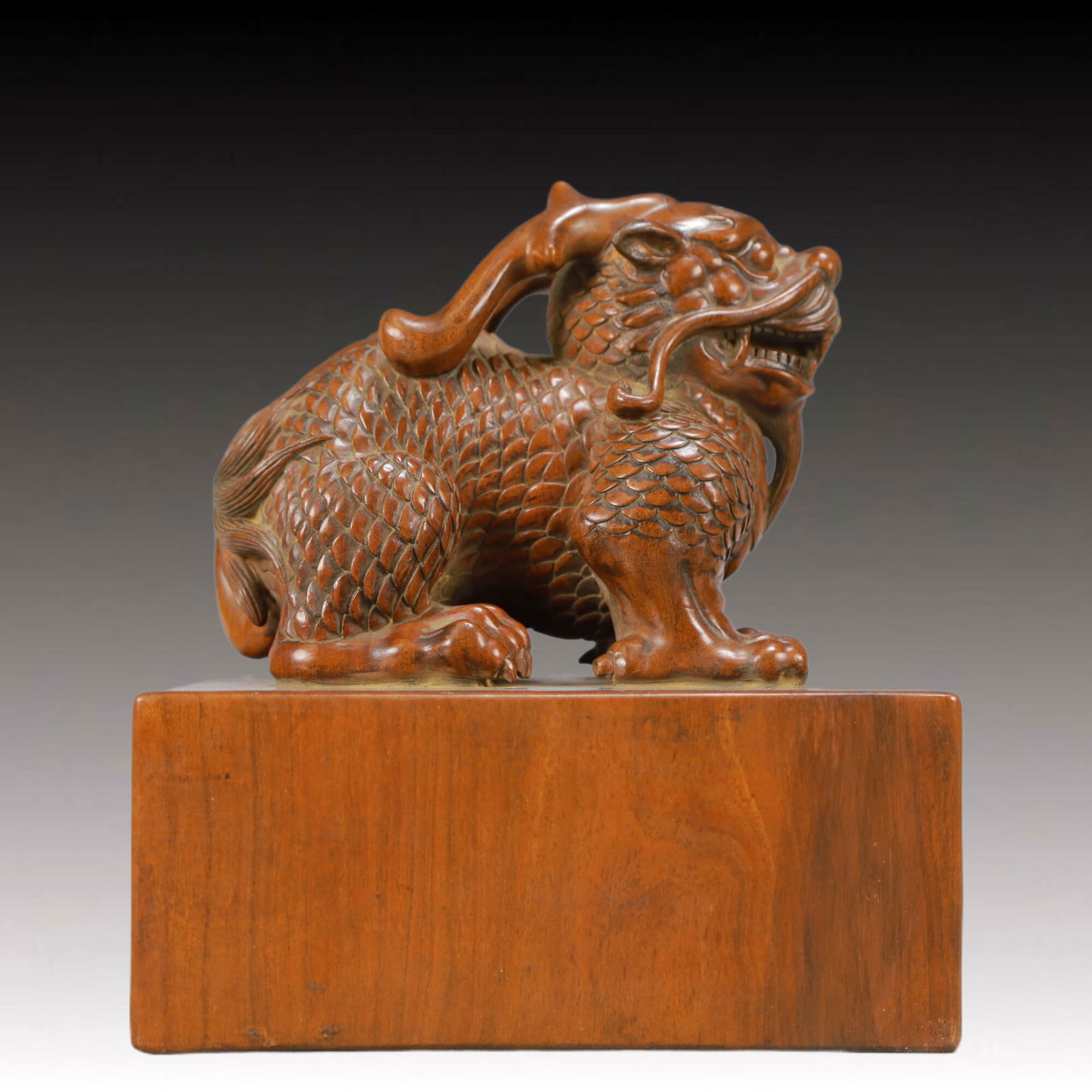 An Exquisite Sandalwood Kylin Seal: An Exquisite Sandalwood Kylin Seal,Qing Dynasty,China,Size:5.5inx5.5inx5.9in,Weight:1500g 檀香木麒麟印章,中国清代
