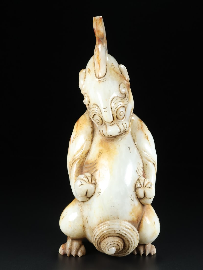 An Exquisite White Jade Auspicious Beast Ornament: An Exquisite White Jade Auspicious Beast Ornament,Qing Dynasty,China,Size:8.7inx3.9in,Weight:1690g 白玉瑞兽摆件,中国清代