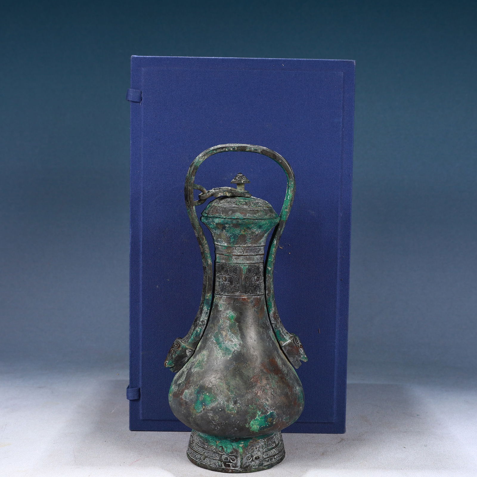 An Archaic Bronze Beast-Ears Vase: An Archaic Bronze Beast-Ears Vase,Qing Dynasty, China,Size:4.7inx10.2in,Weight:1400g 青铜兽耳瓶,中国清代