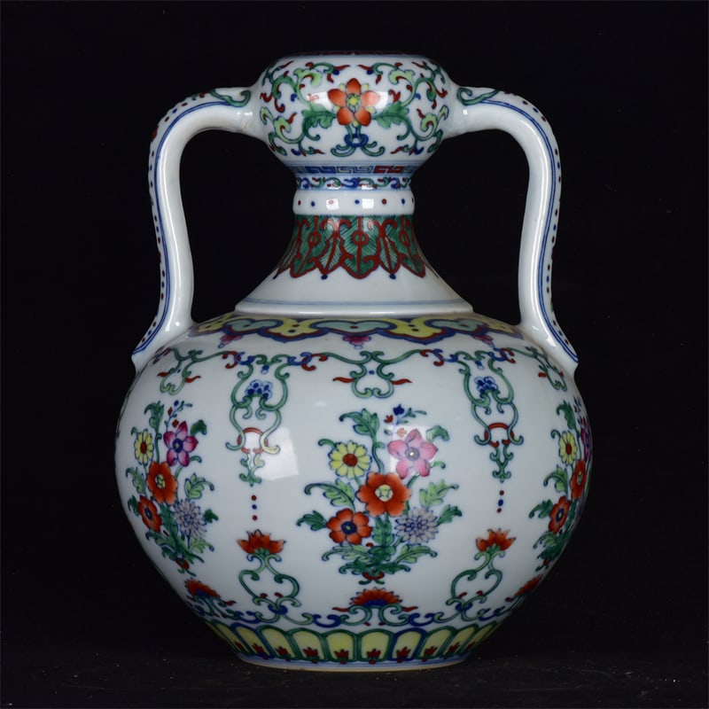 An Exquisite Doucai Lotus Pattern Double-Ears Vase: An Exquisite Doucai Lotus Pattern Double-Ears Vase,Qing Dynasty,China,Yongzheng Six-Character Mark,Size:10.2inx7.9in 斗彩缠枝莲纹双耳瓶,中&#