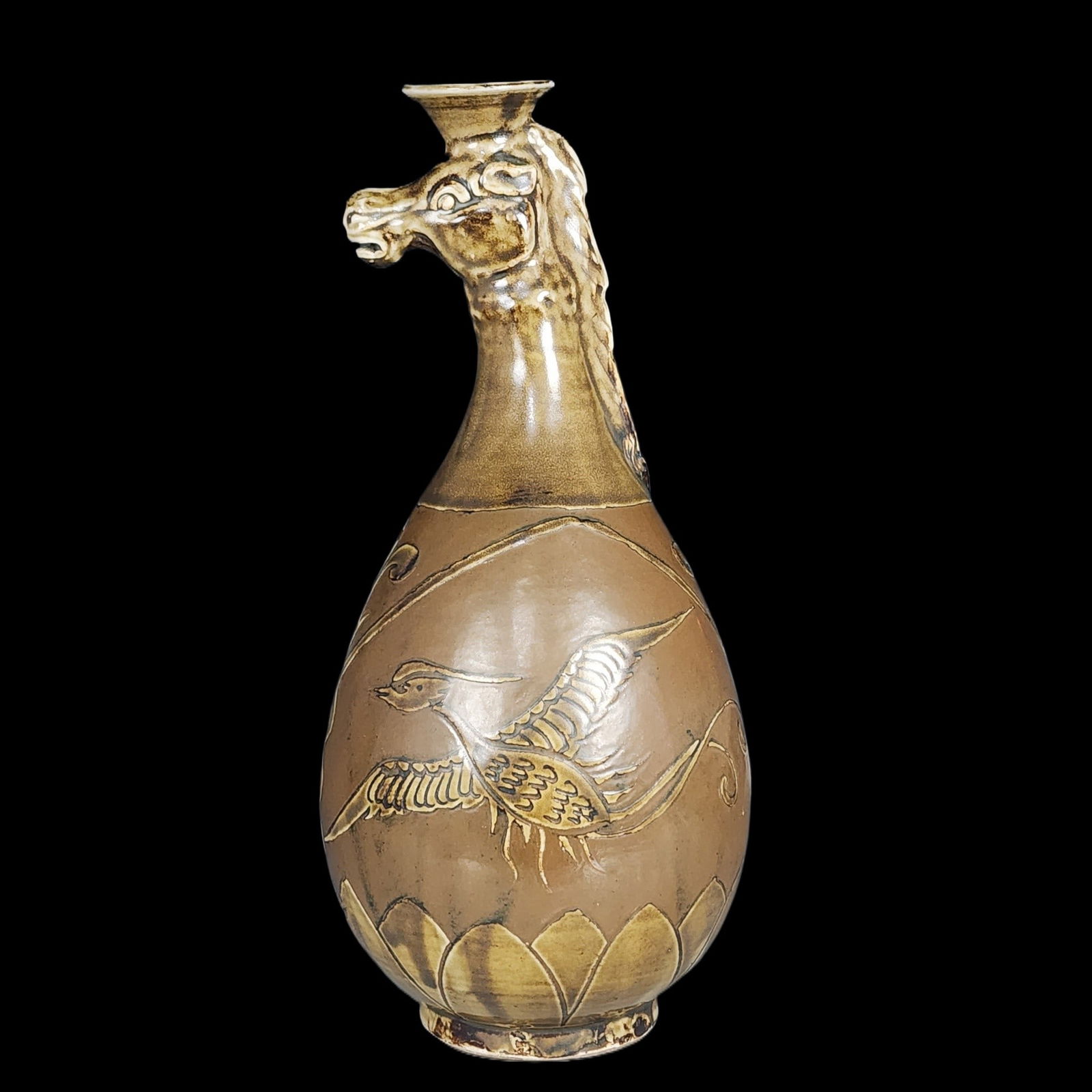 An Exquisite Ding yao Flower and Phoenix Pattern Vase: An Exquisite Ding yao Flower and Phoenix Pattern Vase,Song Dynasty,China,Size:11inx4.7in 定窑花卉凤纹瓶,中国宋代