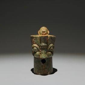 An Archaic Bronze Figure Ornament