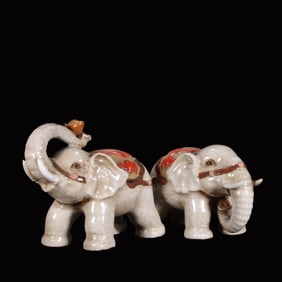 A Pair of Exquisite Shiwan yao Elephant Ornaments