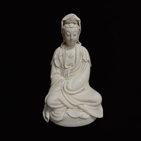 A Solemn Blance-De-Chine Statue of Avalokitesvara