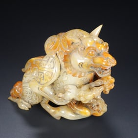 An Archaic Gaogu yu Auspicious Beast Ornament