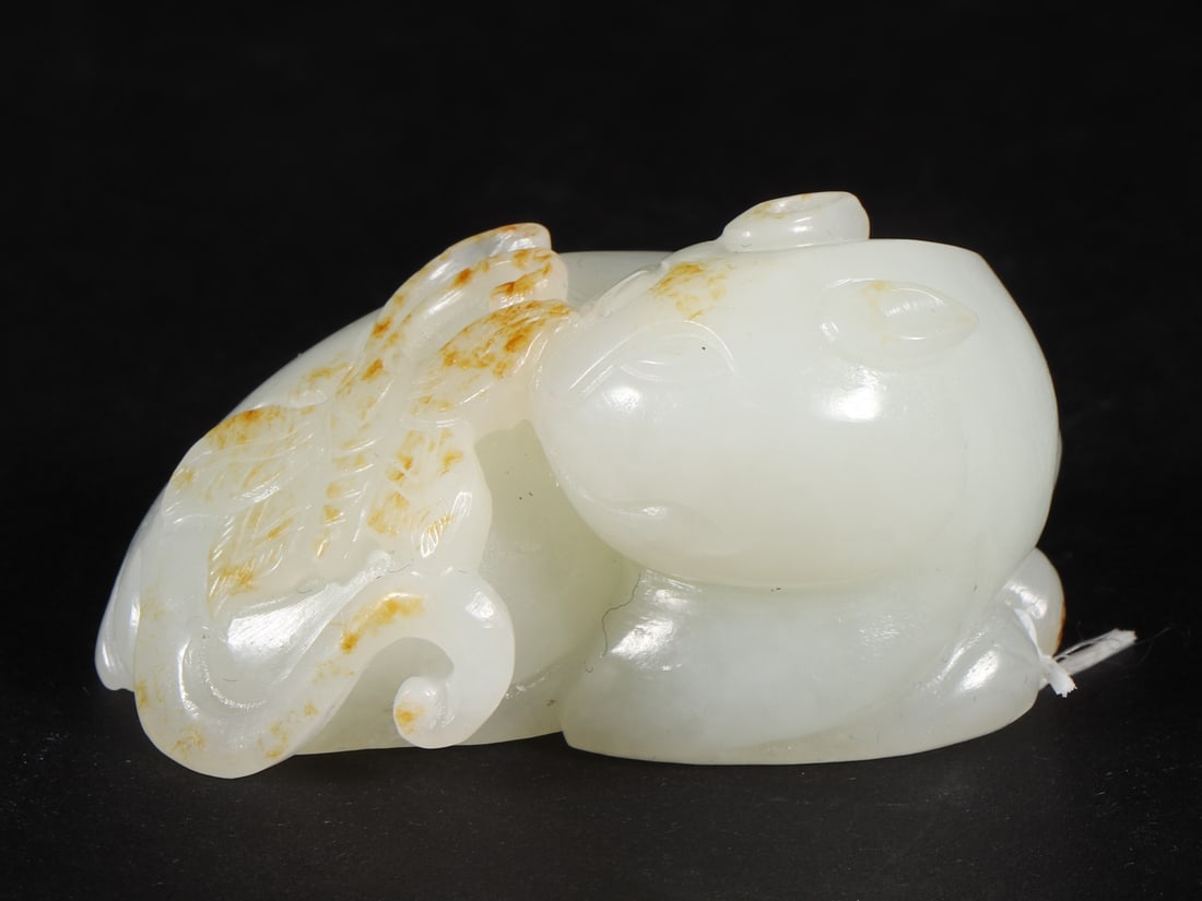 An Exquisite White Jade Auspicious Beast Ornament (1 of 9)