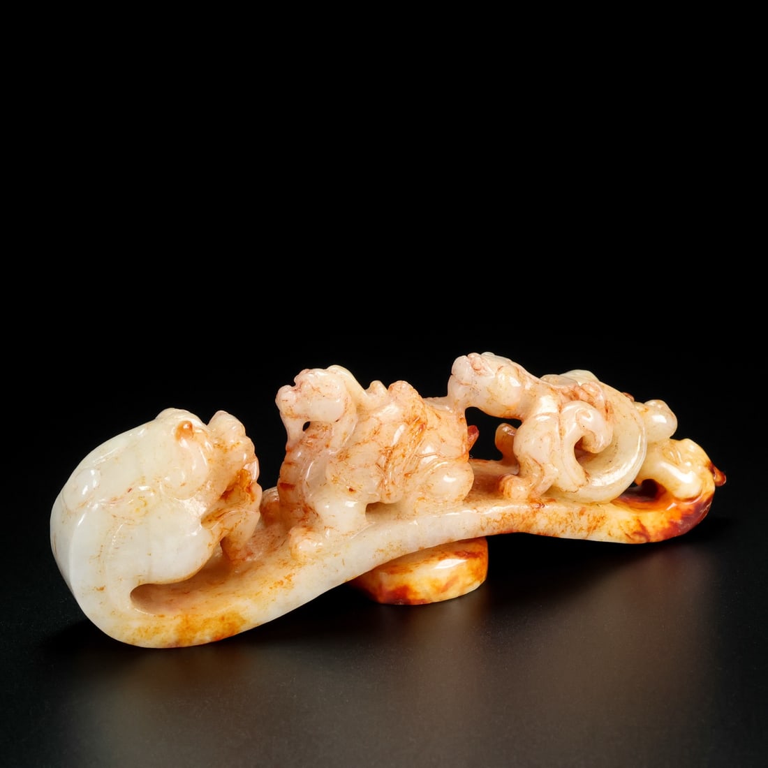 An Exquisite White Jade Dragon Pattern Ruyi (1 of 9)