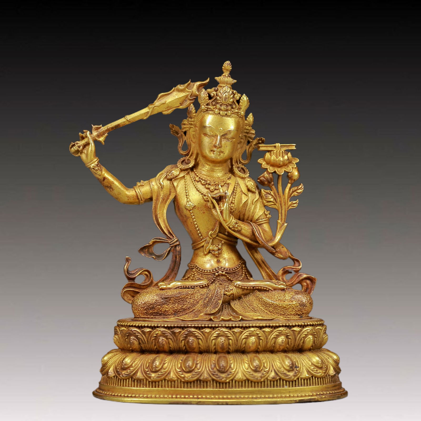 A Solemn Gilt Bronze Statue of Manjusri: A Solemn Gilt Bronze Statue of Manjusri,Ming Dynasty, China,Size:3.1inx6.1inx4.1in,Weight:255g 铜鎏金文殊菩萨像，明代