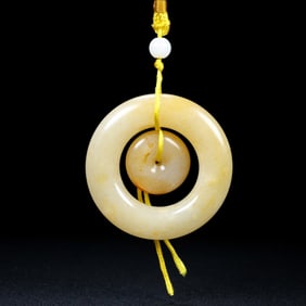 An Exquisite White Jade Pendant