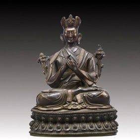 A Solemn Bronze Statue of Guru