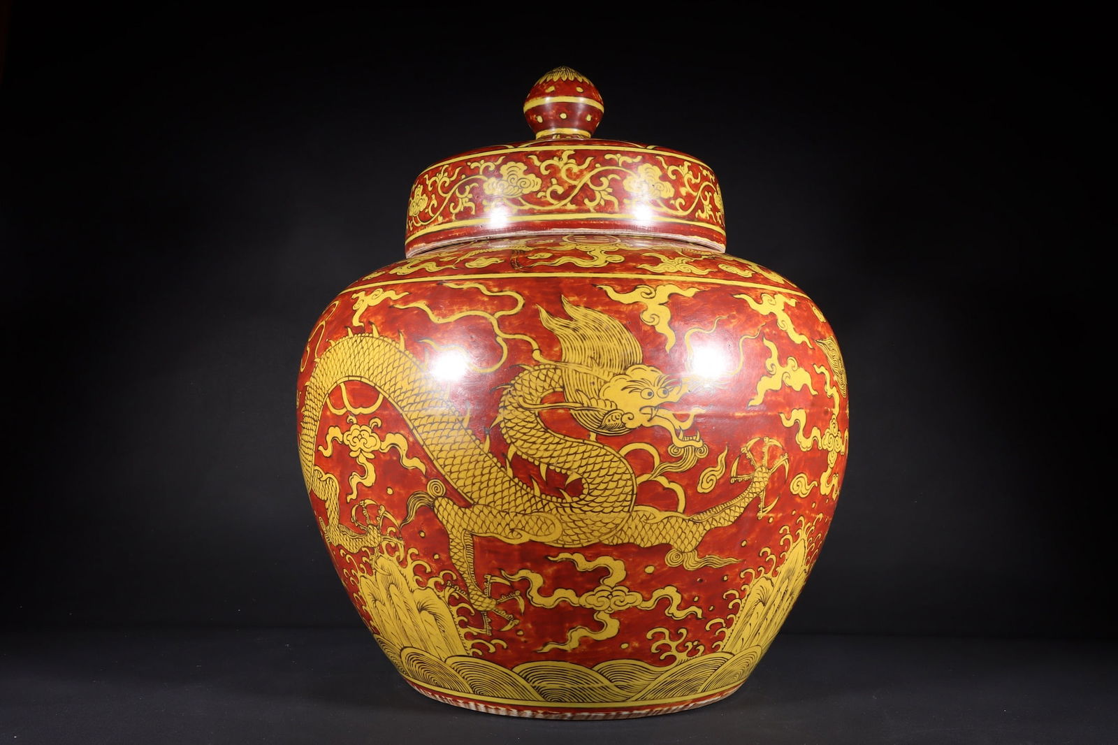 A Huge Red Ground Yellow Glazed Seawater and Dragon Pattern Jar with Cover: A Huge Red Ground Yellow Glazed Seawater and Dragon Pattern Jar with Cover,Ming Dynasty,China,Jiajing Six-Character Mark,Size:18.5inx15.7in 