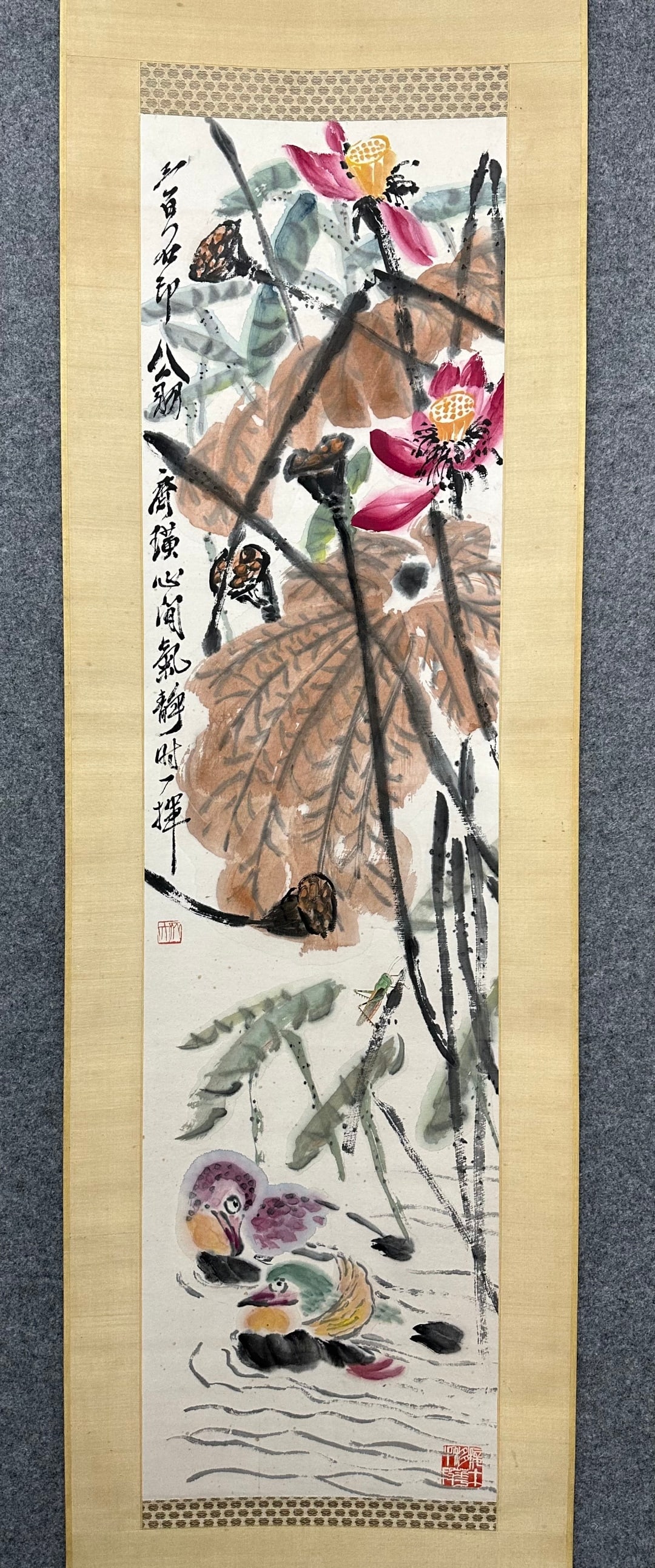 A Chinese Vertical Scroll Ink Painting of Flower and Mandarin Duck on Paper: A Chinese Vertical Scroll Ink Painting of Flower and Mandarin Duck on Paper,Qi Baishi,Size:52.4inx13.8in 一幅中国水墨花卉鸳鸯画立