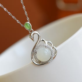 An Exquisite Sterling Silver Inlaid White Jade Pendant