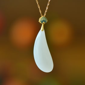 An Exquisite Sterling Silver-Gold Plated Inlaid White Jade Pendant