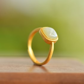 An Exquisite Sterling Silver-Gold Plated Inlaid White Jade Ring