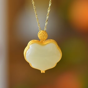 An Exquisite Sterling Silver-Gold Plated Inlaid White Jade Pendant