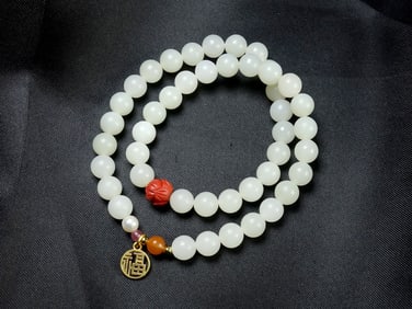 An Exquisite White Jade Bracelets