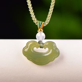 An Exquisite Greenish Jade Pendant
