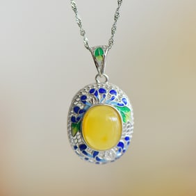 An Exquisite Sterling Silver Inlaid Amber Enamel Pendant