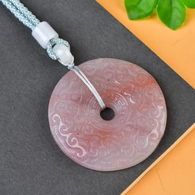 An Exquisite Red Jade Pendant