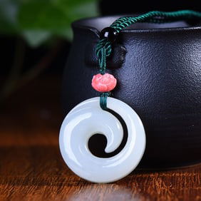 An Exquisite White Jade Pendant