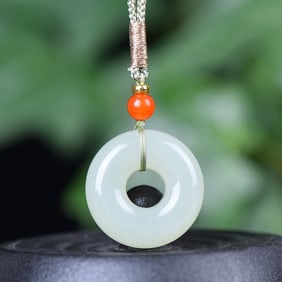 An Exquisite White Jade Pendant