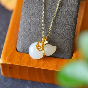 A Pair of Exquisite Sterling Silver-Gold Plated Inlaid White Jade Necklace