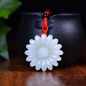 An Exquisite White Jade Pendant