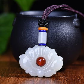 An Exquisite White Jade Lotus Pendant