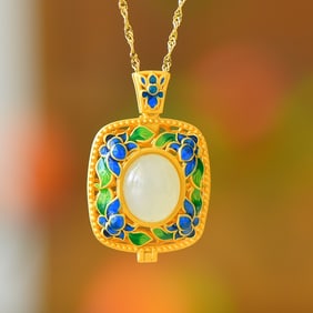 An Exquisite Sterling Silver-Gold Plated Inlaid White Jade Pendant