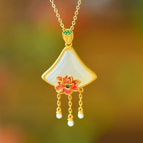 An Exquisite Sterling Silver-Gold Plated Inlaid White Jade Pendant