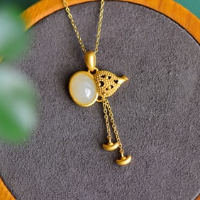 An Exquisite Sterling Silver-Gold Plated Inlaid White Jade Pendant