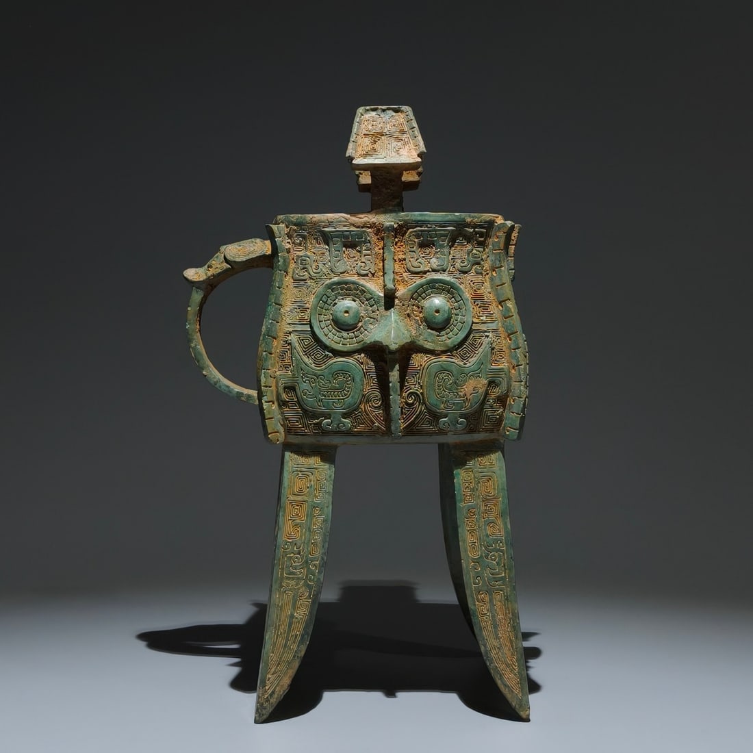 An Archaic Bronze Owl Pattern Libation Cup (1 of 9)