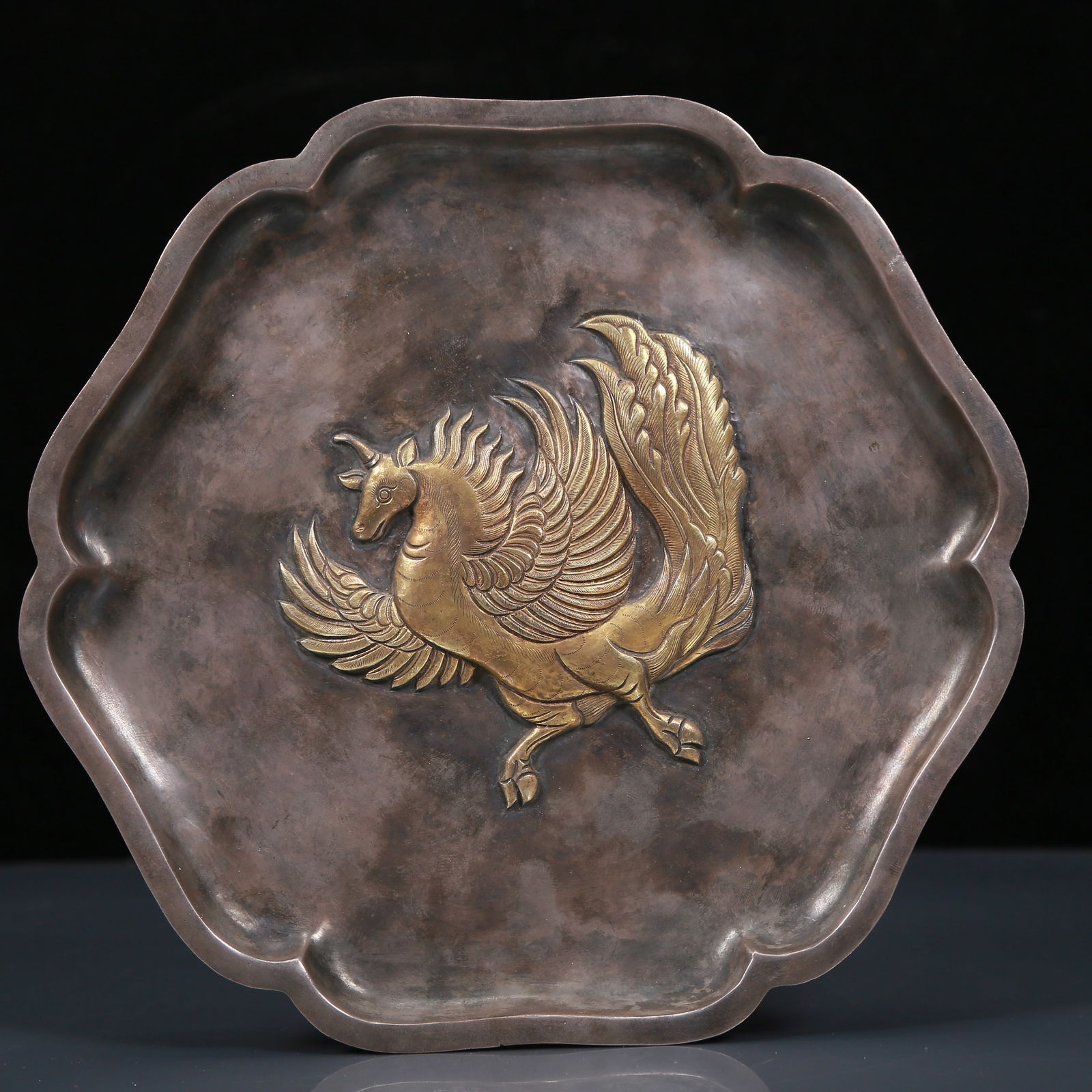An Exquisite Silver Gilt Auspicious Beast Pattern Plate: An Exquisite Silver Gilt Auspicious Beast Pattern Plate,Qing Dynasty, China,Size:7.5inx0.6in,Weight:405g 银鎏金瑞兽纹盘,清代