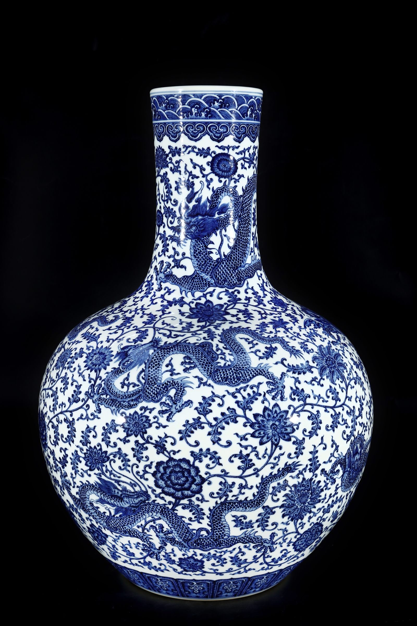 A Huge Blue and White Lotus and Dragon Pattern Vase: A Huge Blue and White Lotus and Dragon Pattern Vase,Qing Dynasty,China,Qianlong Six-Character Mark,Size:29.1inx19.7in 