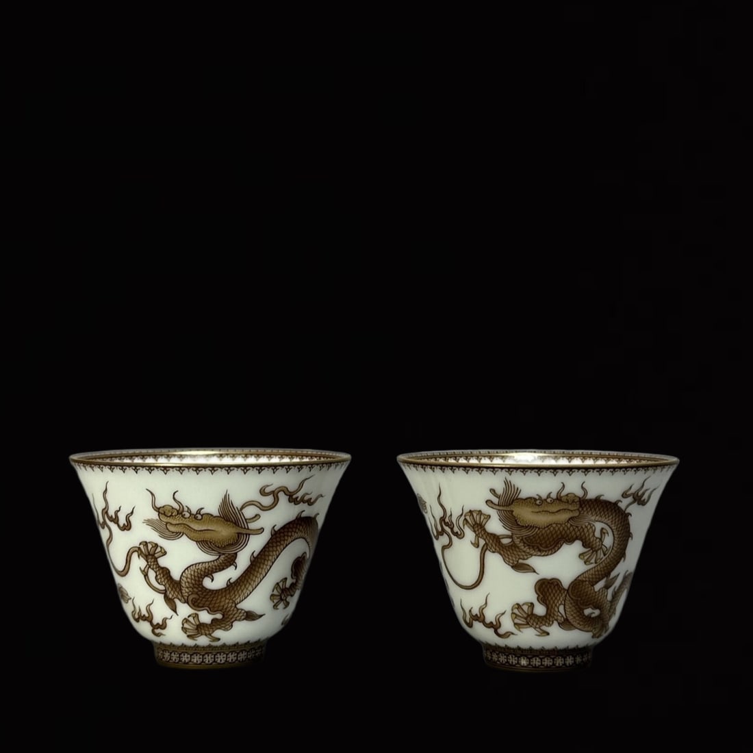 A Pair of Exquisite Ink Color Painted Gold Dragon Pattern Cups: A Pair of Exquisite Ink Color Painted Gold Dragon Pattern Cups,Qing Dynasty,China,Yongzheng Four-Character Mark,Size:1.8inx2.4in 