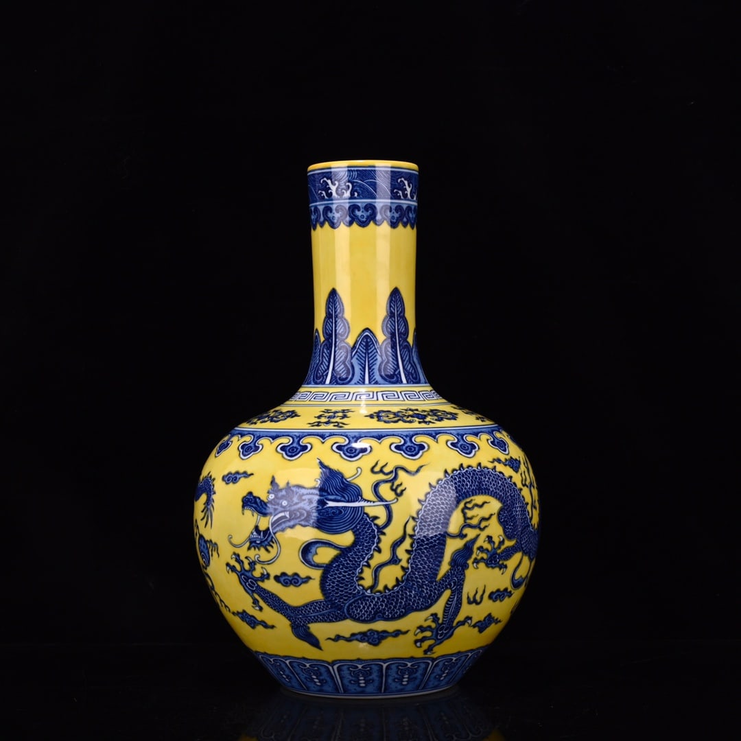 A Rare Yellow Glazed Blue and White Auspicious Cloud and Dragon Pattern Vase (1 of 8)