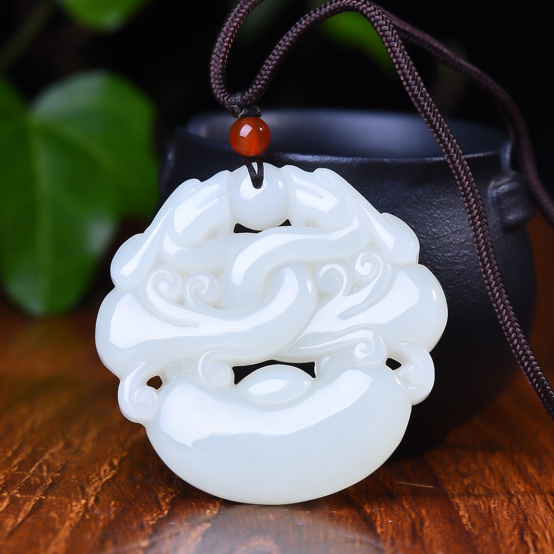 An Exquisite White Jade Dragon Pattern Pendant (1 of 5)