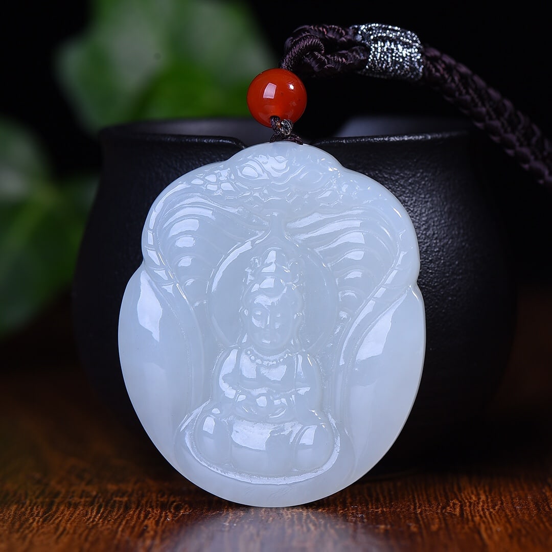 An Exquisite White Jade Statue of Avalokitesvara Pendant: An Exquisite White Jade Statue of Avalokitesvara Pendant,Size:1.7inx1.9inx0.3in 白玉观音像挂件