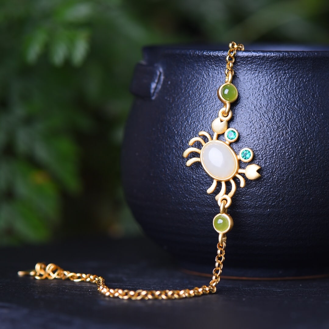 An Exquisite Sterling Silver-Gold Plated Inlaid White Jade Bracelet: An Exquisite Sterling Silver-Gold Plated Inlaid White Jade Bracelet,Size:0.3inx0.2in 纯银镀金镶白玉手链