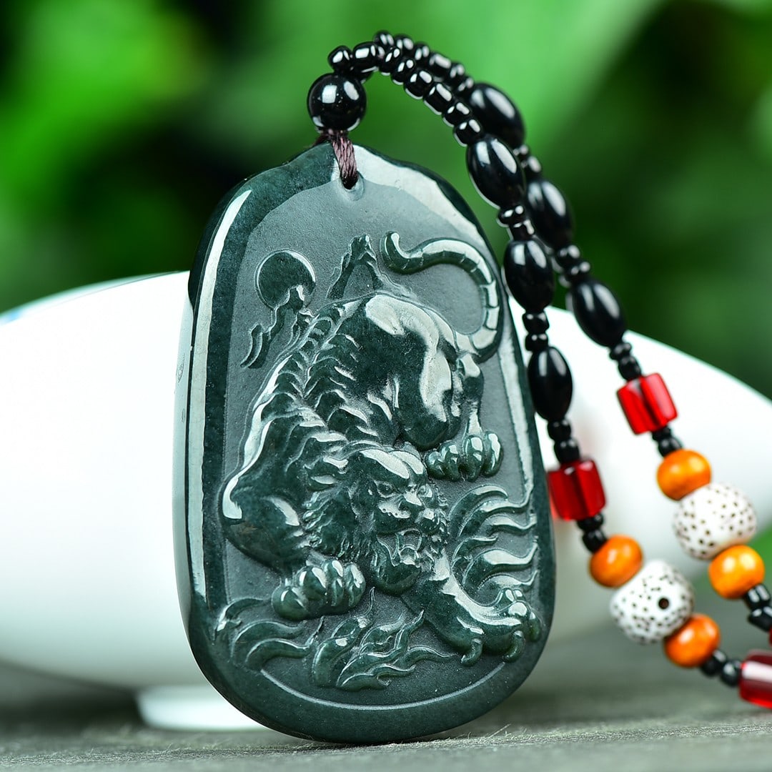 An Exquisite Jasper Tiger Pattern Pendant: An Exquisite Jasper Jade Tiger Pattern Pendant,Size:1.6inx2.5in 碧玉虎纹挂件