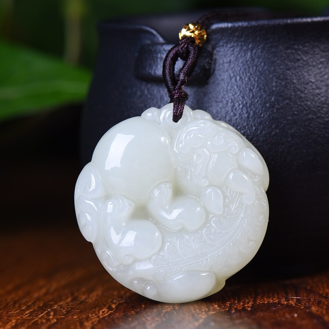 An Exquisite White Jade Wealth-Attracting Creature Pendant: An Exquisite White Jade Wealth-Attracting Creature Pendant,Size:1.4inx1.4in 白玉貔貅挂件
