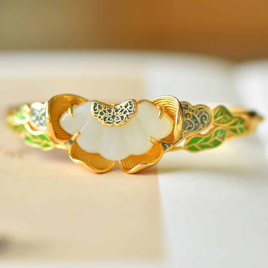 An Exquisite Sterling Silver-Gold Plated Inlaid White Jade Enamel Bracelet: An Exquisite Sterling Silver-Gold Plated Inlaid White Jade Enamel Bracelet,Size:0.6inx1.1in 纯银镀金镶白玉珐琅手镯