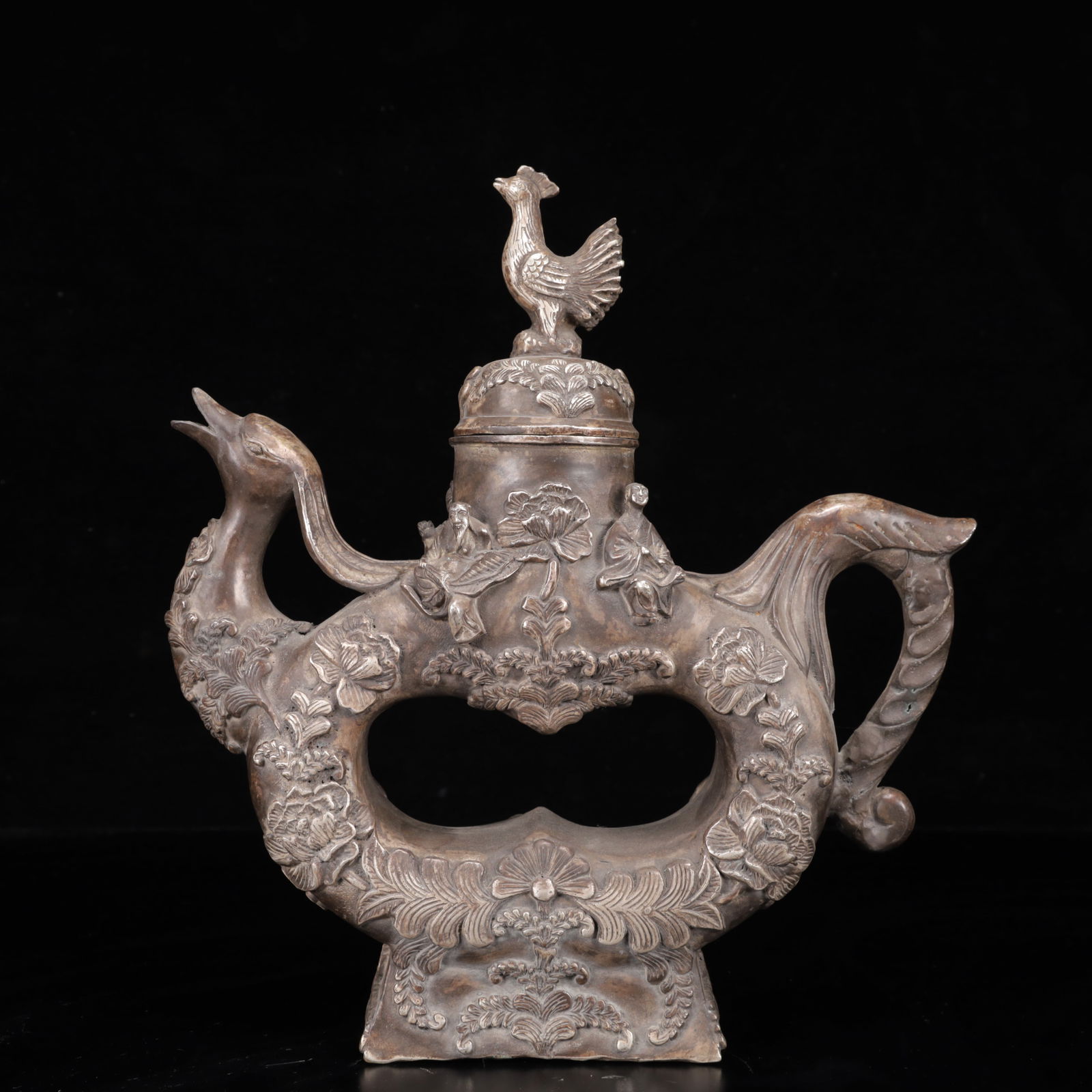 An Exquisite Silver Flower Pattern Phoenix Ornament: An Exquisite Silver Flower Pattern Phoenix Ornament,Ming Dynasty,China,Xuande Six-Character Mark,Size:10.2inx2.8inx11in,Weight:2000g 银花卉纹凤摆件,中&#