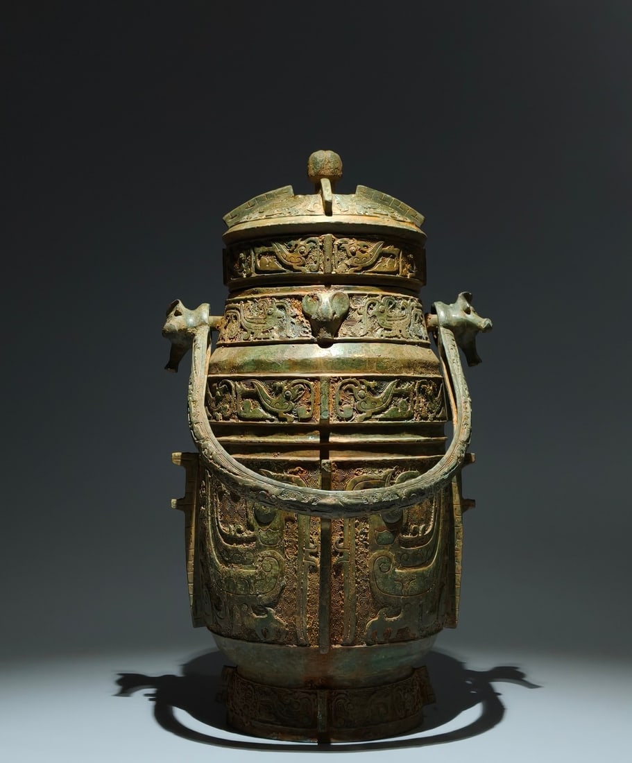 An Archaic Bronze Phoenix Pattern Loop-Handled Pot (1 of 9)