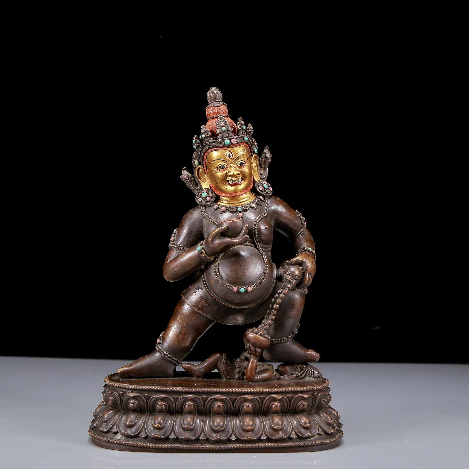 A Solemn Gilt Bronze Inlaid Gems Statue of Mammon: A Solemn Gilt Bronze Inlaid Gems Statue of Mammon,Qing Dynasty, China,Size:7.9inx4.3inx11.4in,Weight:2980g 