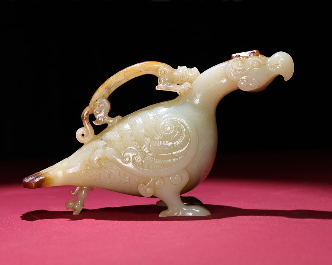 An Exquisite White Jade Phoenix Ornament: An Exquisite White Jade Phoenix Ornament,Qing Dynasty,China,Size:8.5inx4.3inx2.8in,Weight:1067g 白玉凤摆件,中国清代