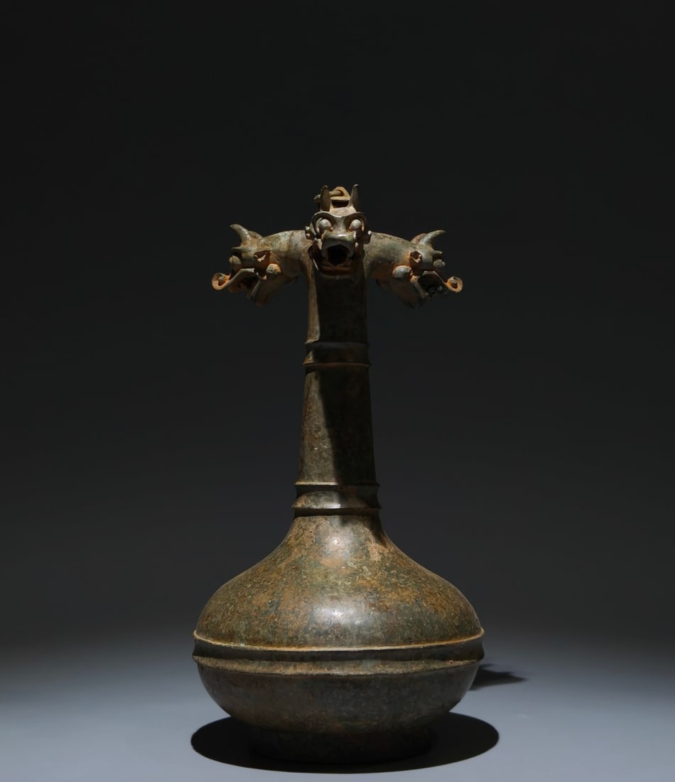 An Archaic Bronze Dragon-head Bottle (1 of 9)